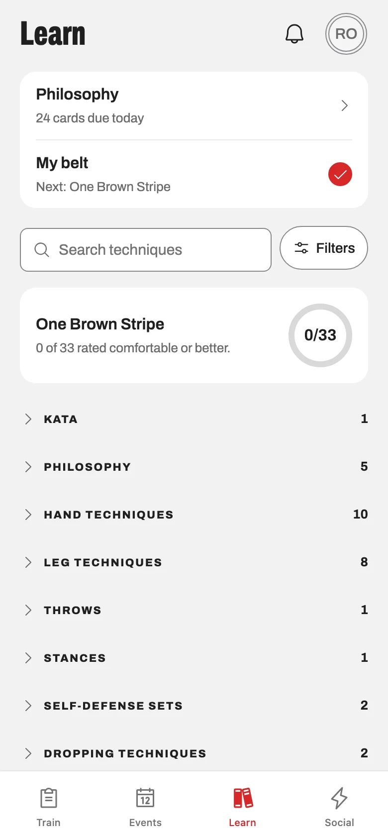 Learn screen showing the sample school’s Cuong Nhu curriculum by belt rank.